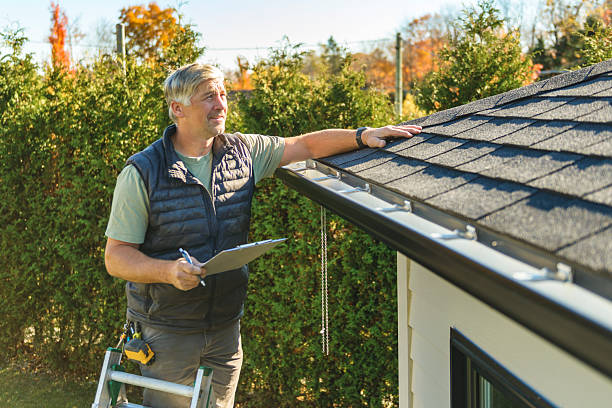 Professional Roofing technician working in Garrison, MD
